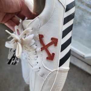 White Sneakers with Orange Logo